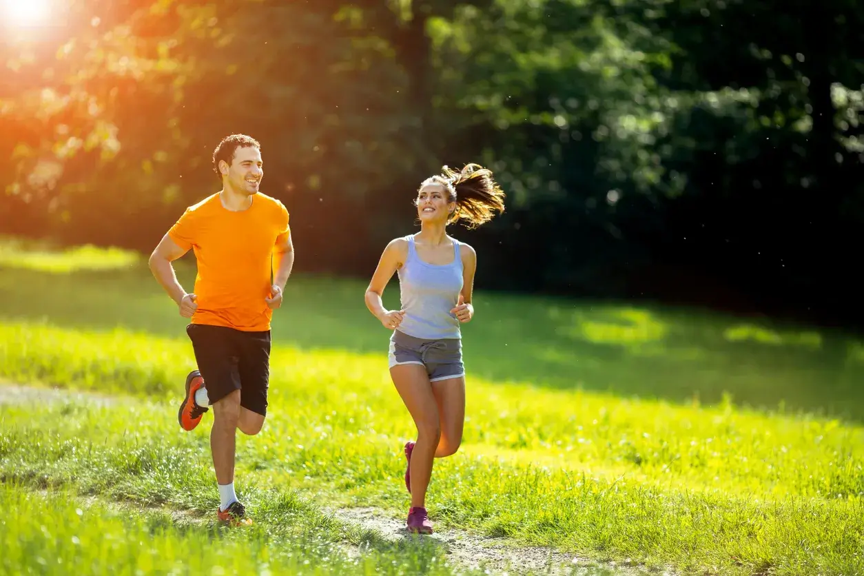 man woman running together