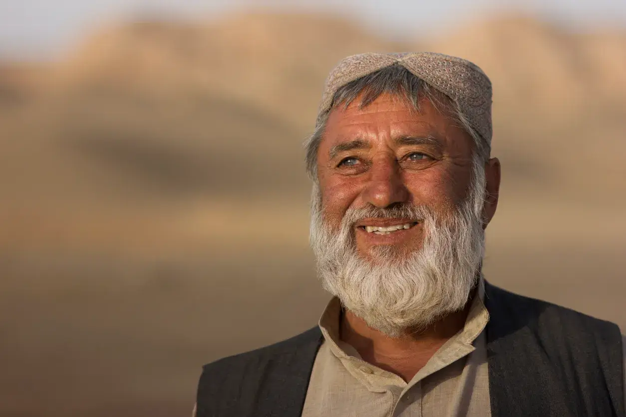 afghan walking in the terrain