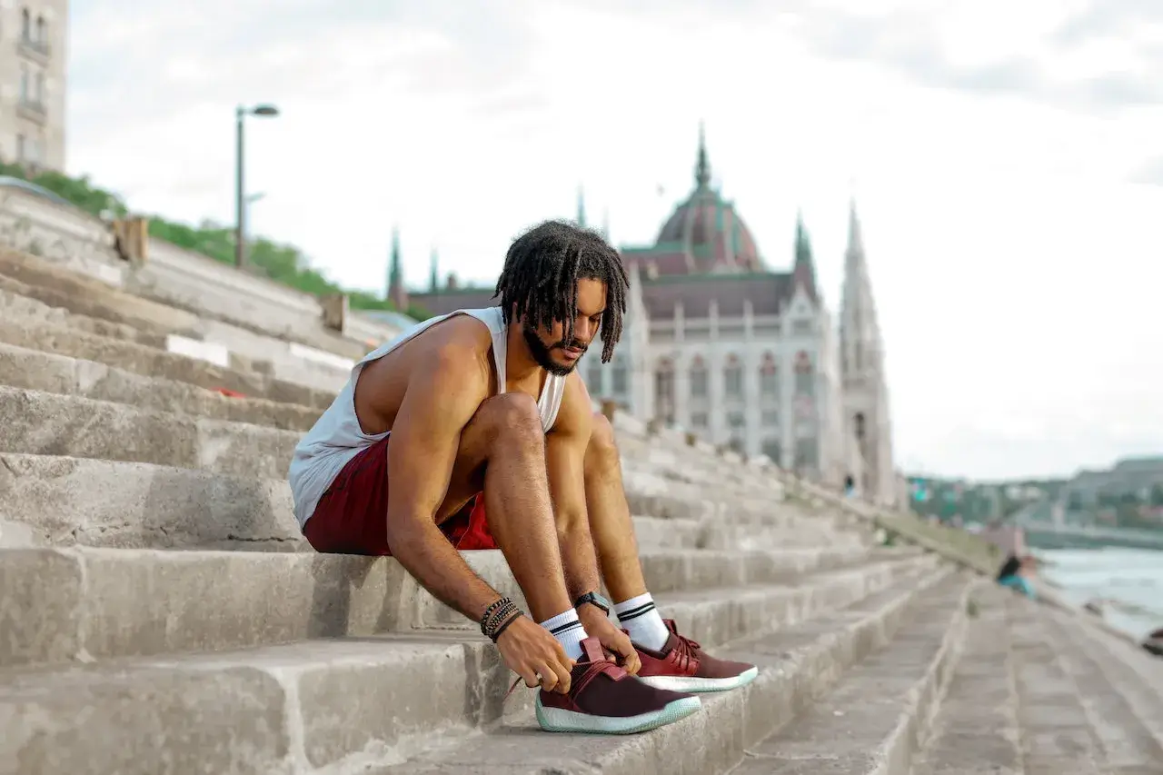 man gearing up for half marathon